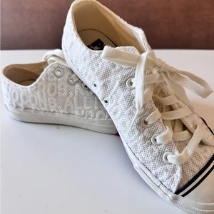 Converse size M7 for male and 9. 1/2 female with lace like material,white